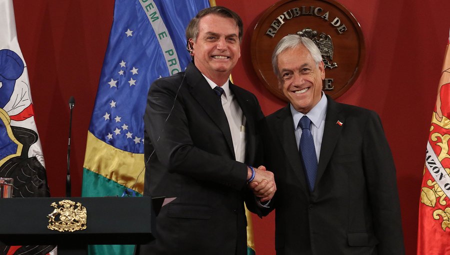 Piñera defendió a Bolsonaro en Francia, ante críticas por incendios en la Amazonía